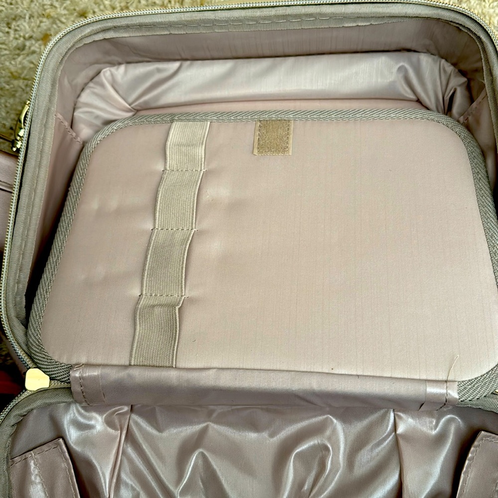 Hardside Triforce toiletries carrier.